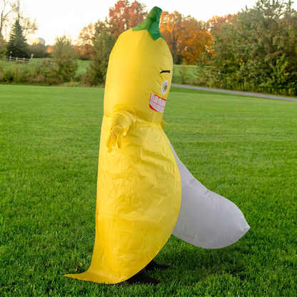 Side profile of blow up banana costume showing the curved white fruit body and yellow peel flaps