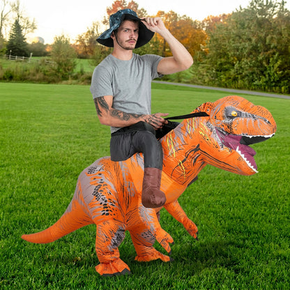Three quarter view of inflatable ride on T-Rex costume with orange striped body and open toothy jaw