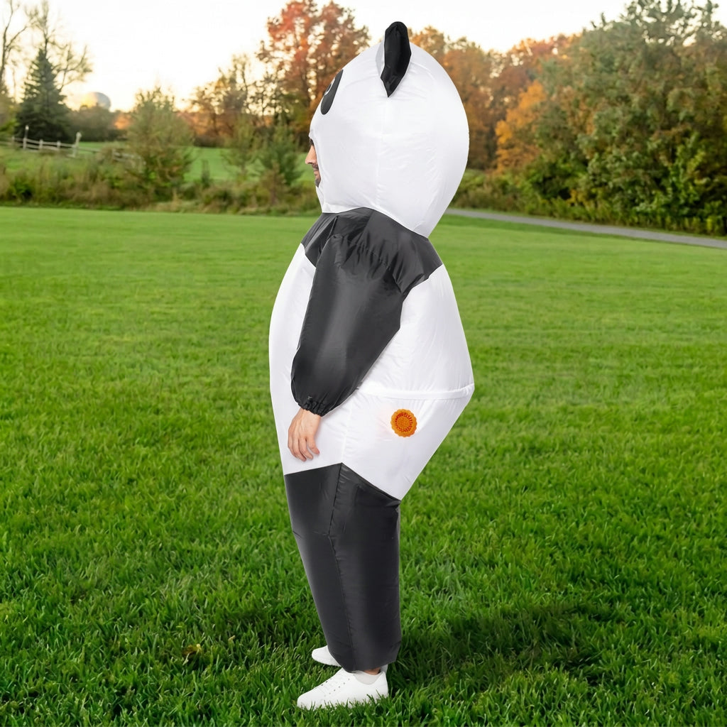 Side profile of inflatable panda costume showing round body, black arm and panda ear