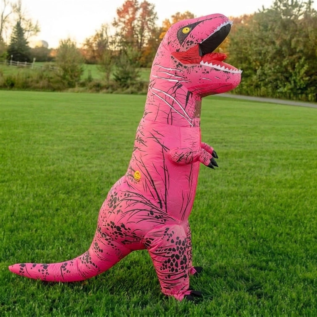 Three quarter view of pink blow up dinosaur costume showing the long tail and dark pattern details